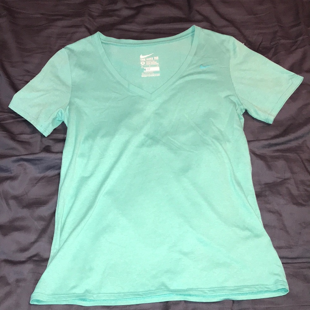 blue nike athletic shirt
